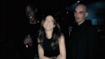 Man And Woman Dancing In Dark Room GIF