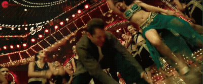 Man And Woman Dancing In Front Of 50 Sign GIF