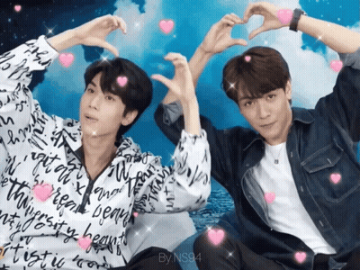 Man And Woman Dancing In Front Of 50 Sign GIF