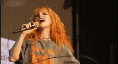 Man And Woman Dancing In Front Of Crowd GIF