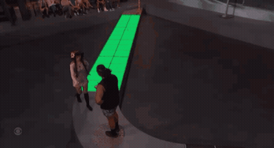 Man And Woman Dancing In Front Of Hotel Sign GIF