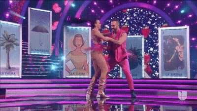 Man And Woman Dancing In Front Of La Sirena Cards GIF
