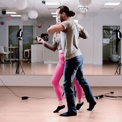 Man And Woman Dancing In Front Of Mirror GIF