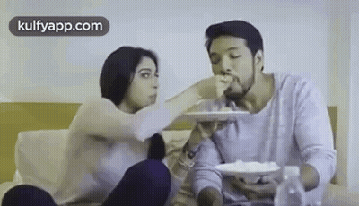 Man And Woman Dancing In Front Of Soldiers GIF