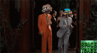 Man And Woman Dancing In Front Of Space Toadz Sign GIF