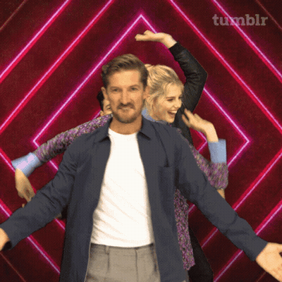 Man And Woman Dancing In Front Of Tumblr Banner GIF