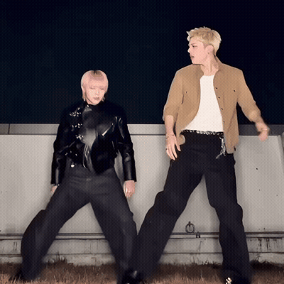 Man And Woman Dancing In Front Of Wall GIF