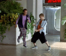 Man And Woman Dancing In Hallway GIF