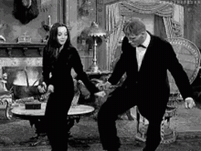 Man and Woman Dancing in Living Room Black and White