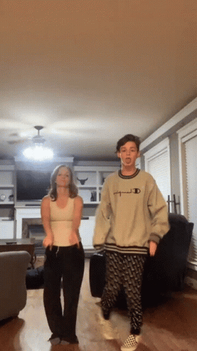 Man And Woman Dancing In Living Room GIF