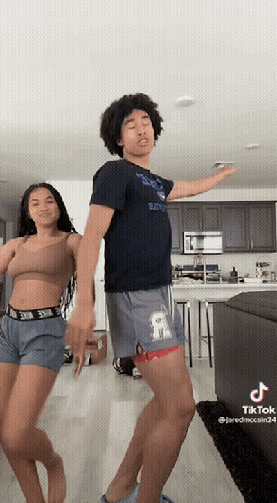 Man And Woman Dancing In Living Room GIF