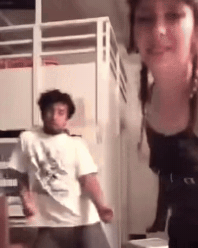 Man And Woman Dancing In Room With Bunk Bed GIF