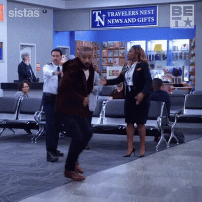 Man And Woman Dancing In Waiting Room GIF