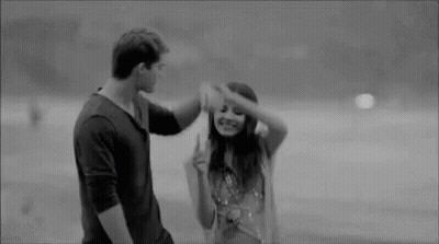 Man And Woman Dancing In Water GIF