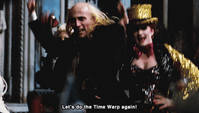 Man And Woman Dancing Let's Do The Time Warp Again GIF