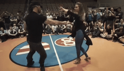 Man And Woman Dancing On Basketball Court GIF