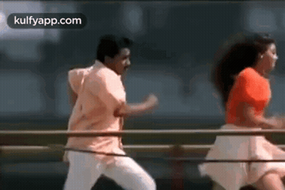 Man And Woman Dancing On Bridge GIF