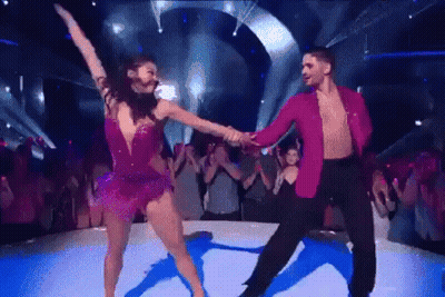 Man And Woman Dancing On Stage GIF