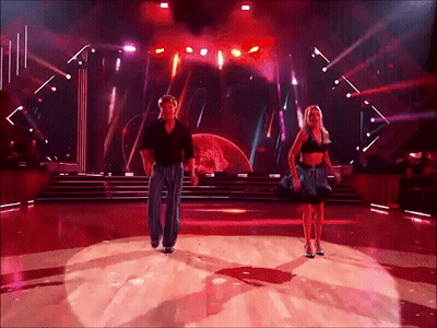 Man And Woman Dancing On Stage GIF