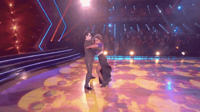 Man And Woman Dancing On Stage GIF