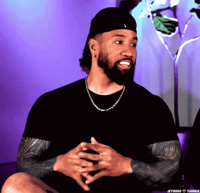 Man And Woman Dancing On Stage In Front Of Crowd GIF