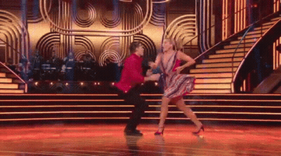 Man And Woman Dancing On Stage GIF