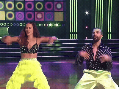 Man And Woman Dancing On Stage GIF