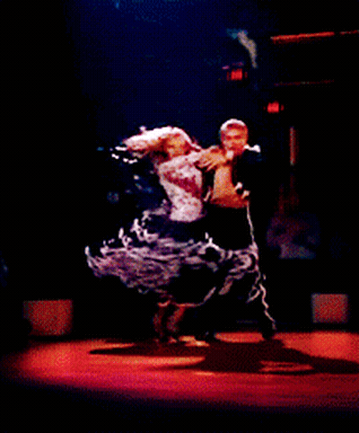Man And Woman Dancing On Stage GIF
