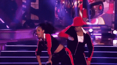 Man And Woman Dancing On Stage, Woman In Red Hat GIF