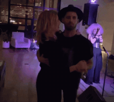 Man And Woman Dancing On Stage, Woman Singing GIF