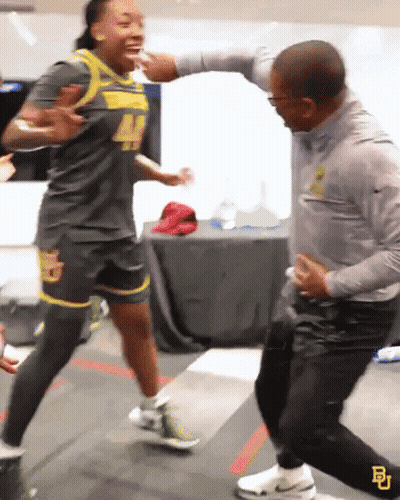 Man And Woman Dancing With Nike Shirt GIF