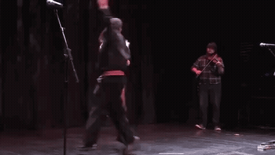 Man And Woman Dancing With Violin Player GIF
