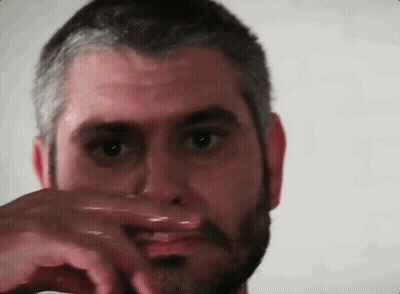 Man And Woman Drinking In Front Of After Dark Sign GIF