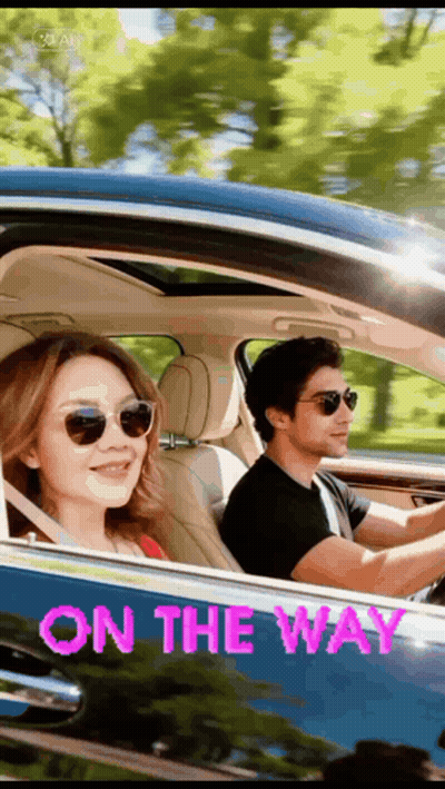 Man And Woman Driving Car Saying On The Way GIF