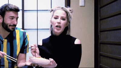 Man And Woman Eating Food With Chopsticks GIF