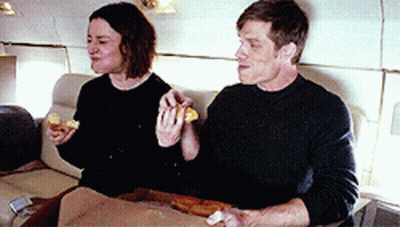 Man And Woman Eating Pizza GIF