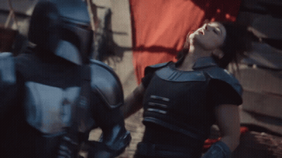 Man And Woman Fighting In Armor GIF