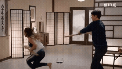 Man And Woman Fighting With Sword GIF