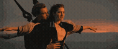 Man And Woman Flying Through Ocean Air GIF