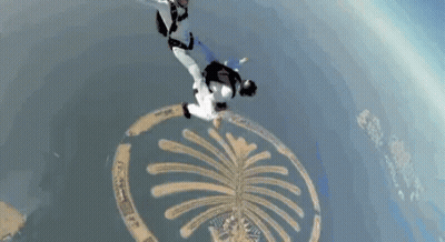 Man And Woman Flying With Logo GIF