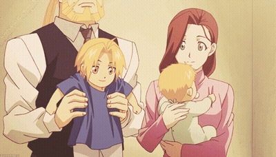 Man And Woman Holding Baby GIF