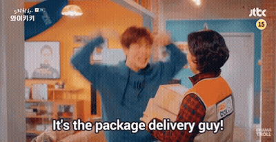 Man And Woman Holding Boxes Says It's The Package Delivery Guy GIF