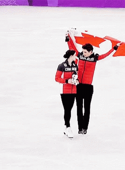 Man And Woman Holding Canadian Flag GIF