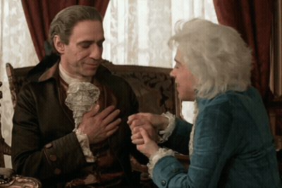 Man And Woman Holding Hands And Smiling GIF