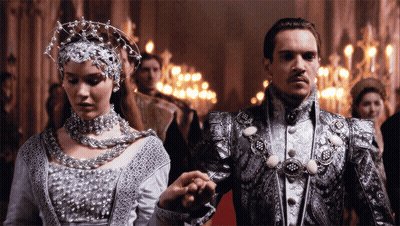 Man And Woman Holding Hands In Hallway GIF