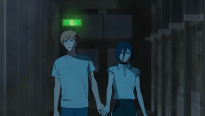 Man And Woman Holding Hands In Hallway With Green Exit Sign GIF