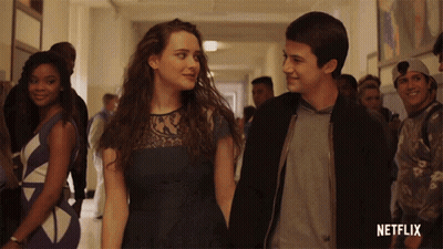 Man And Woman Holding Hands In Netflix Hallway GIF