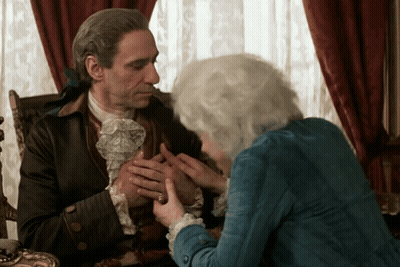 Man And Woman Holding Hands In Room GIF
