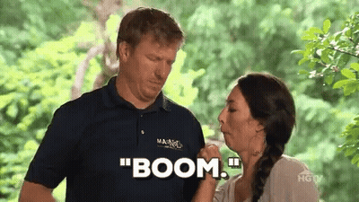 Man And Woman Holding Hands Saying Boom GIF