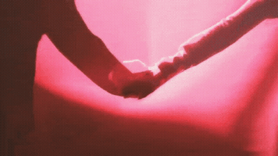 Man And Woman Holding Hands GIF